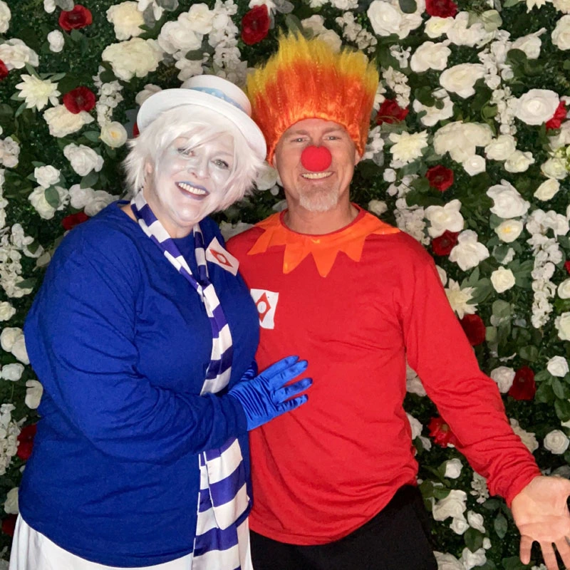 man and woman dressed as the Snow Miser and Heat Miser